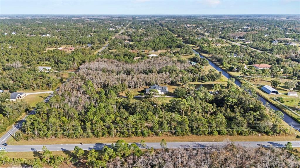 2 Ralston Street Orlando, FL 32833 - Photo 8 of 12 a view of a yard with an outdoor seating