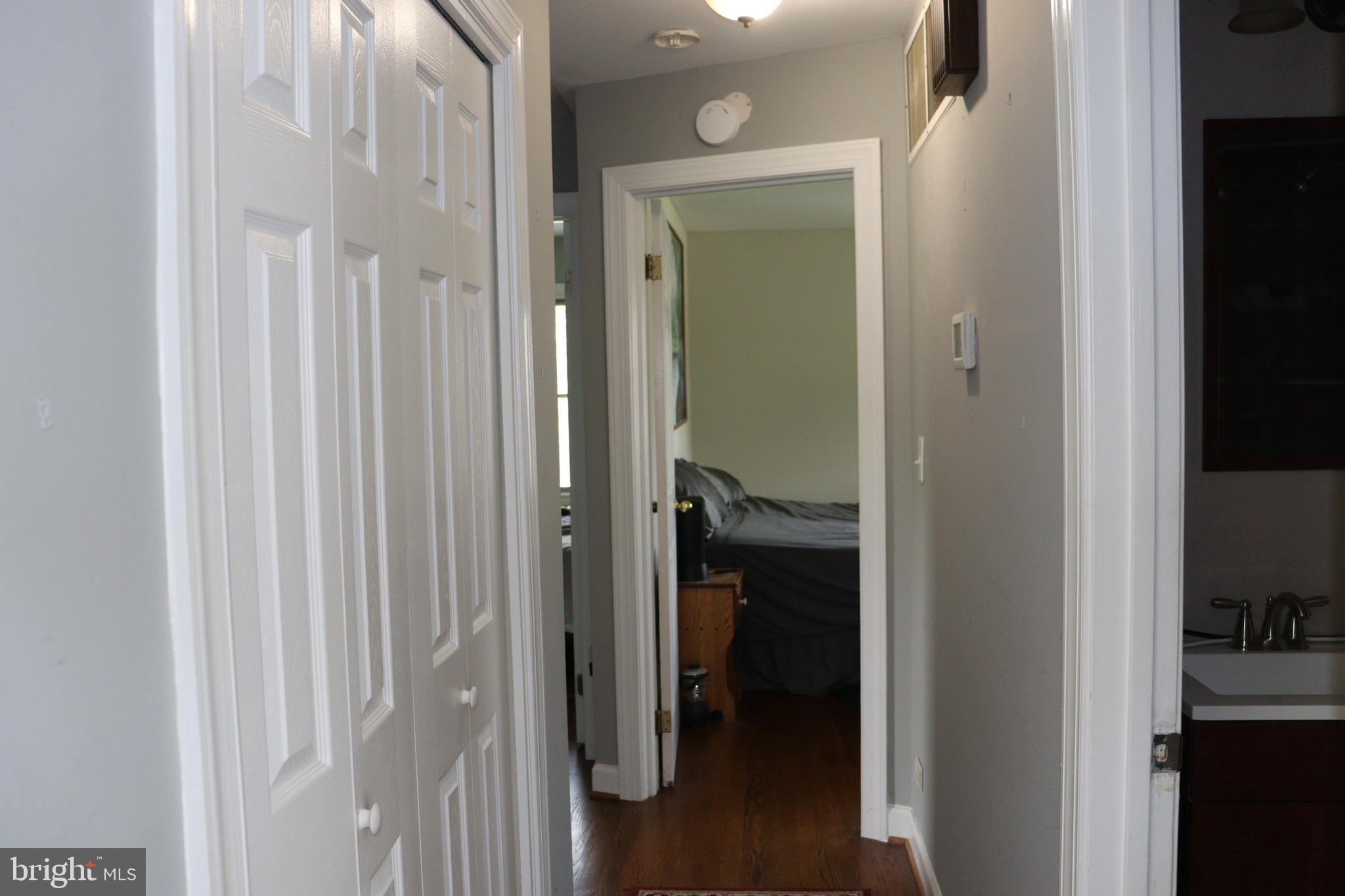229 Dover Road Warrenton, VA 20186 - Photo 15 of 32 a view of a bathroom from a hallway