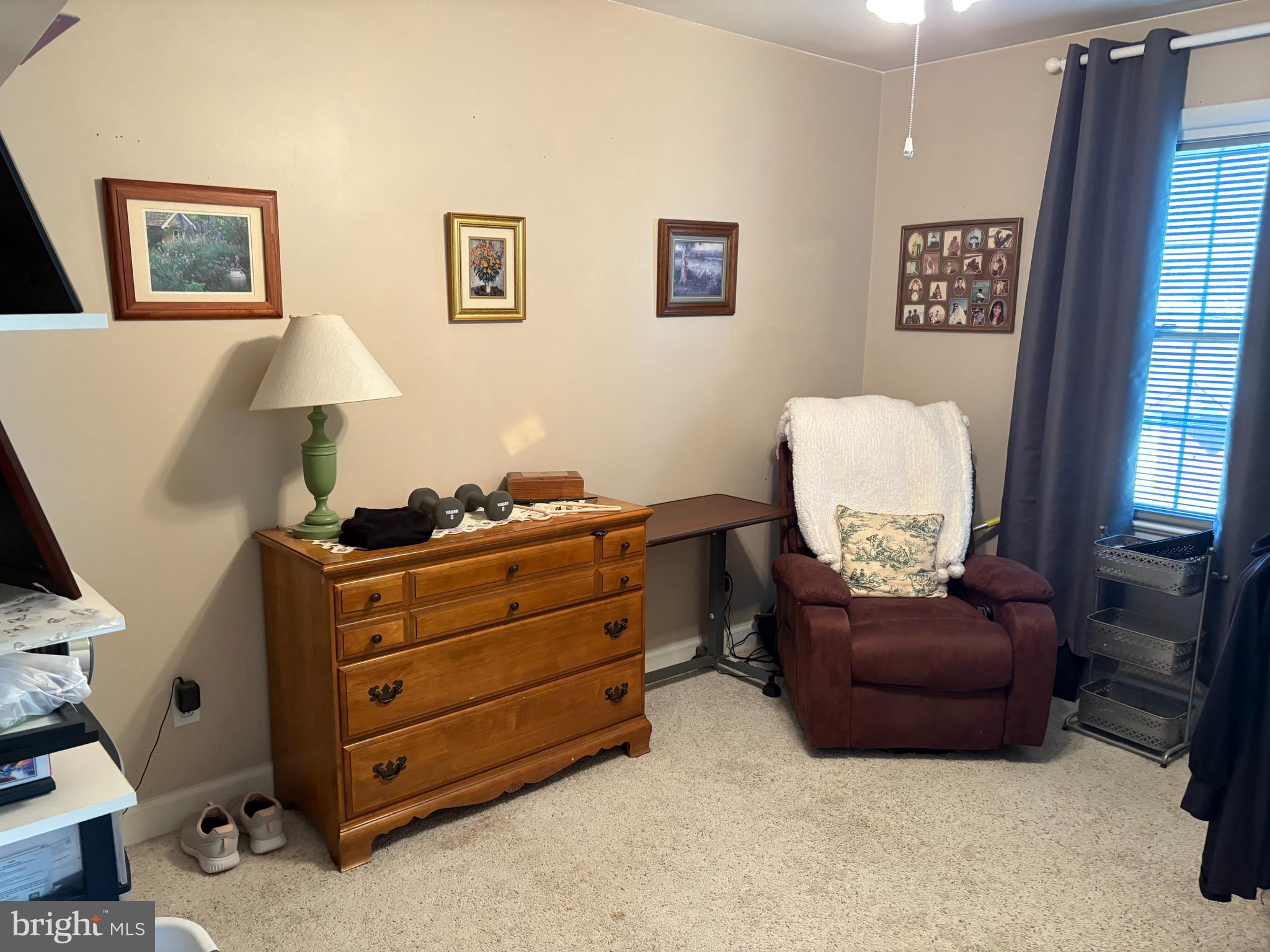 229 Dover Road Warrenton, VA 20186 - Photo 17 of 32 a room with furniture and a window