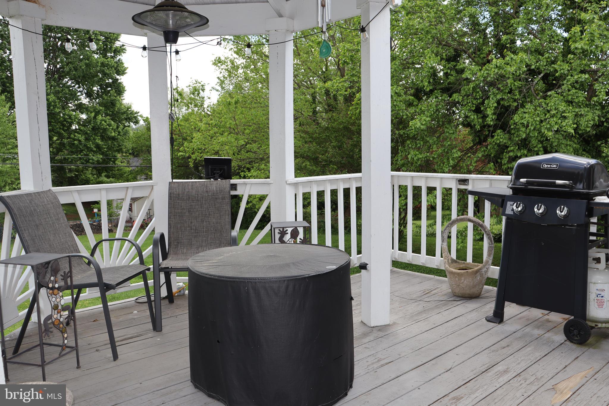 229 Dover Road Warrenton, VA 20186 - Photo 2 of 32 a view of a two chairs and table in the balcony