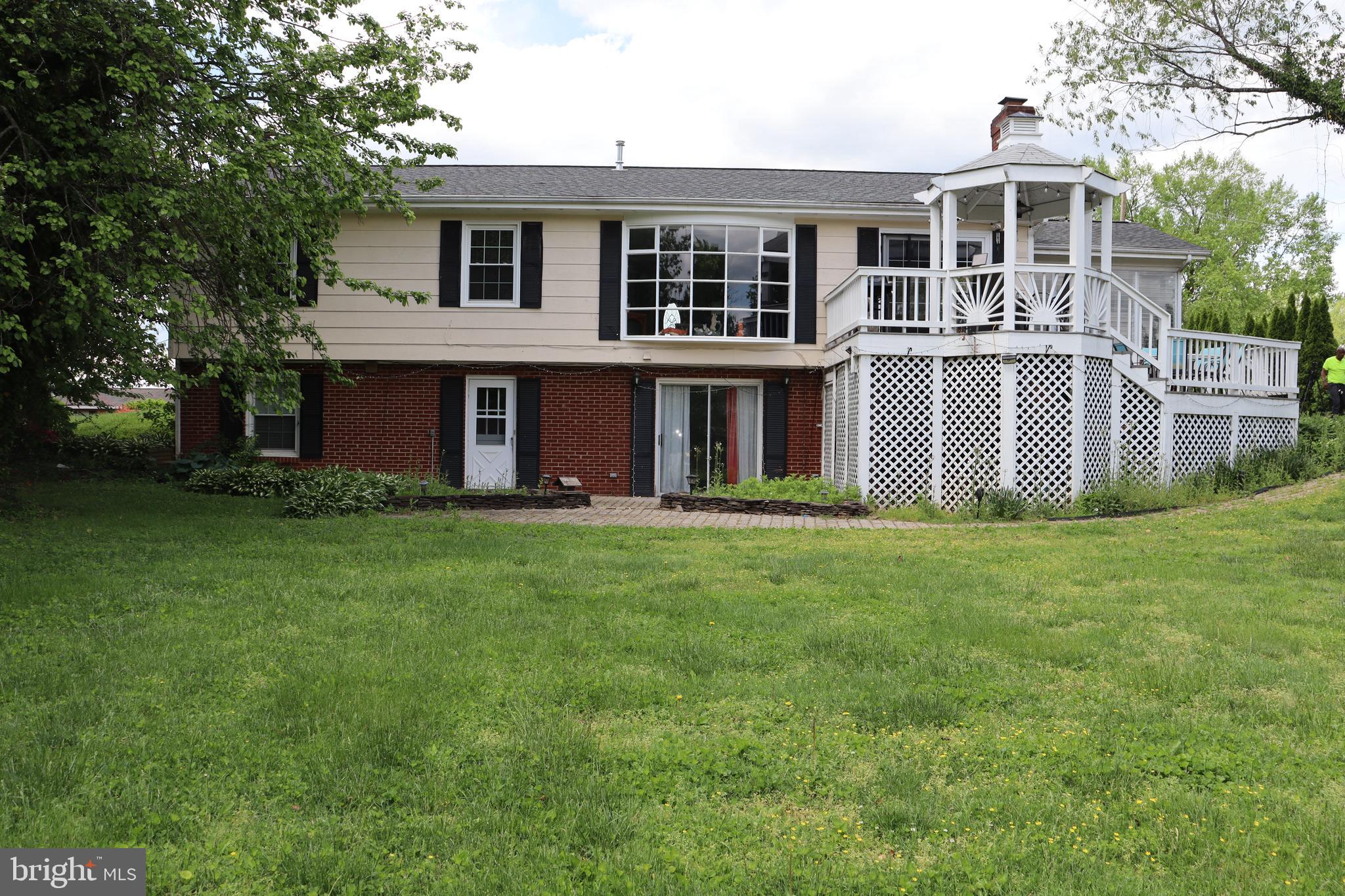 229 Dover Road Warrenton, VA 20186 - Photo 3 of 32 a front view of house with yard and green space