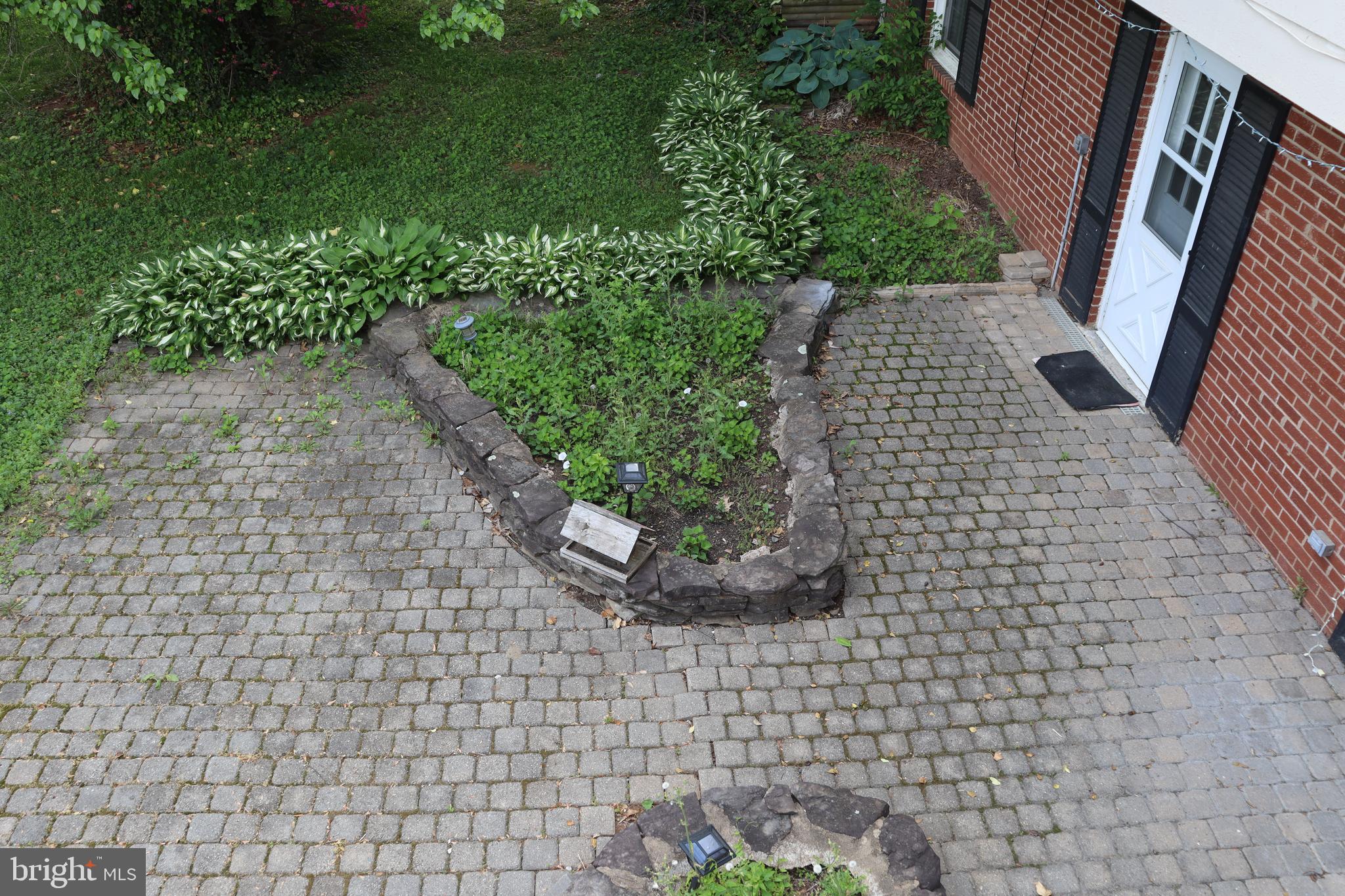 229 Dover Road Warrenton, VA 20186 - Photo 31 of 32 a view of a backyard with plants