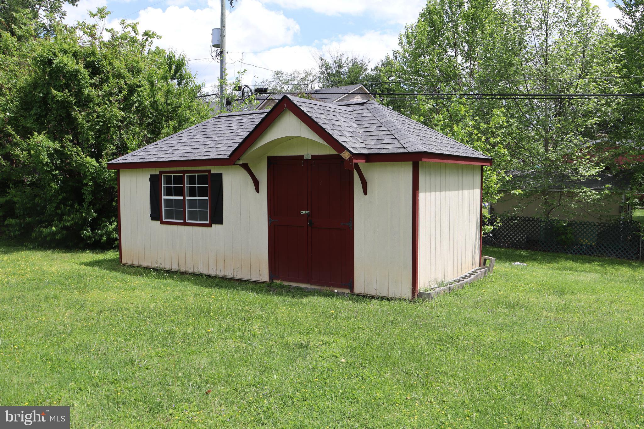 229 Dover Road Warrenton, VA 20186 - Photo 32 of 32 a view of a barn house with a yard