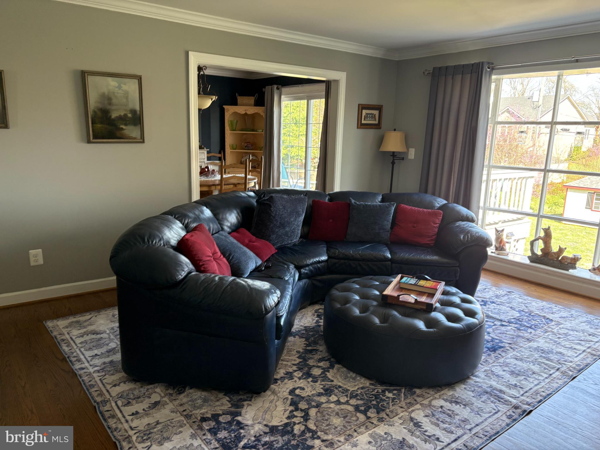 229 Dover Road Warrenton, VA 20186 - Photo 4 of 32 a living room with furniture and a large window