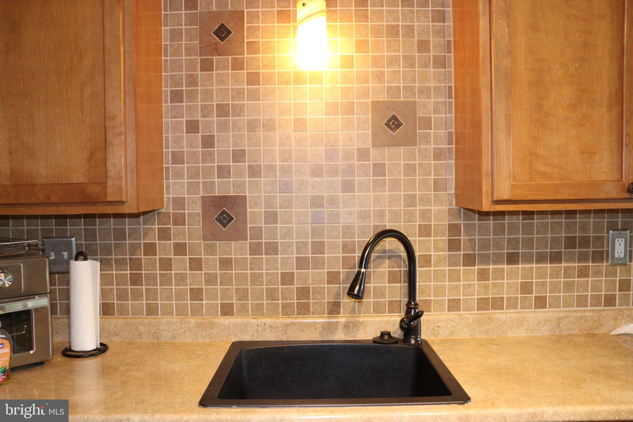 229 Dover Road Warrenton, VA 20186 - Photo 10 of 32 a bathroom with a sink a toilet a mirror and shower