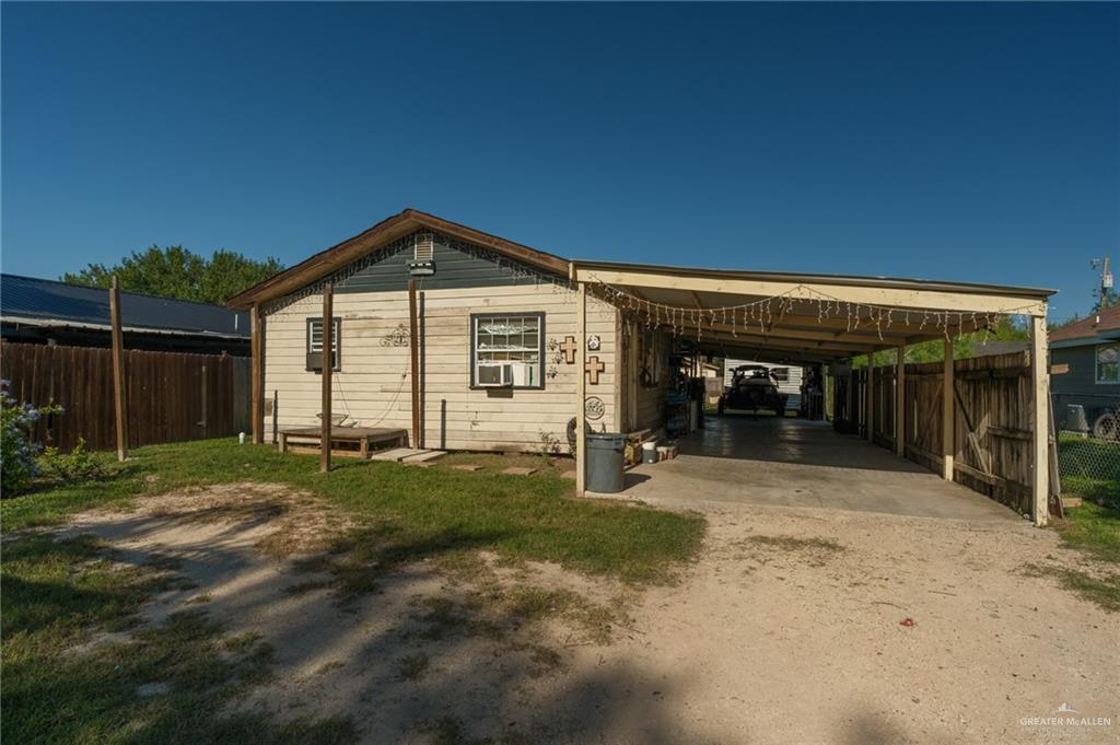 22899 Angel Street Primera, TX 78552 - Photo 1 of 19 a view of a house with backyard and porch