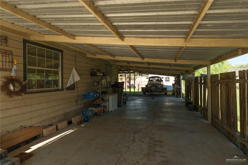 22899 Angel Street Primera, TX 78552 - Photo 11 of 19 a view of a room with gym equipment