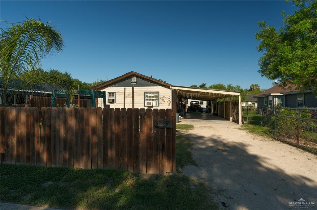 22899 Angel Street Primera, TX 78552 - Photo 19 of 19 a front view of a house with a garden
