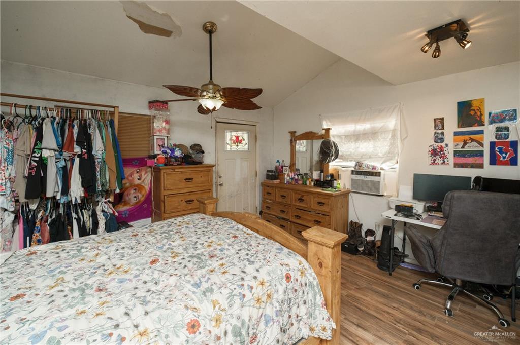 22899 Angel Street Primera, TX 78552 - Photo 6 of 19 a bed room with a bed a desk and chair