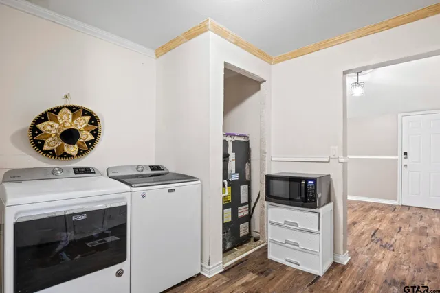a kitchen with a stove and a microwave