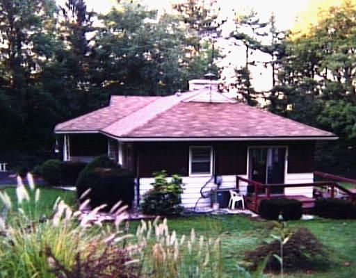 263 Daniels Farm Road Trumbull, CT 06611 - Photo 1 of 1 a view of a house with patio