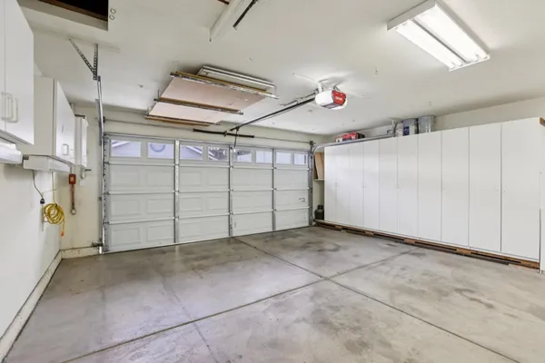a front view of a house with an garage