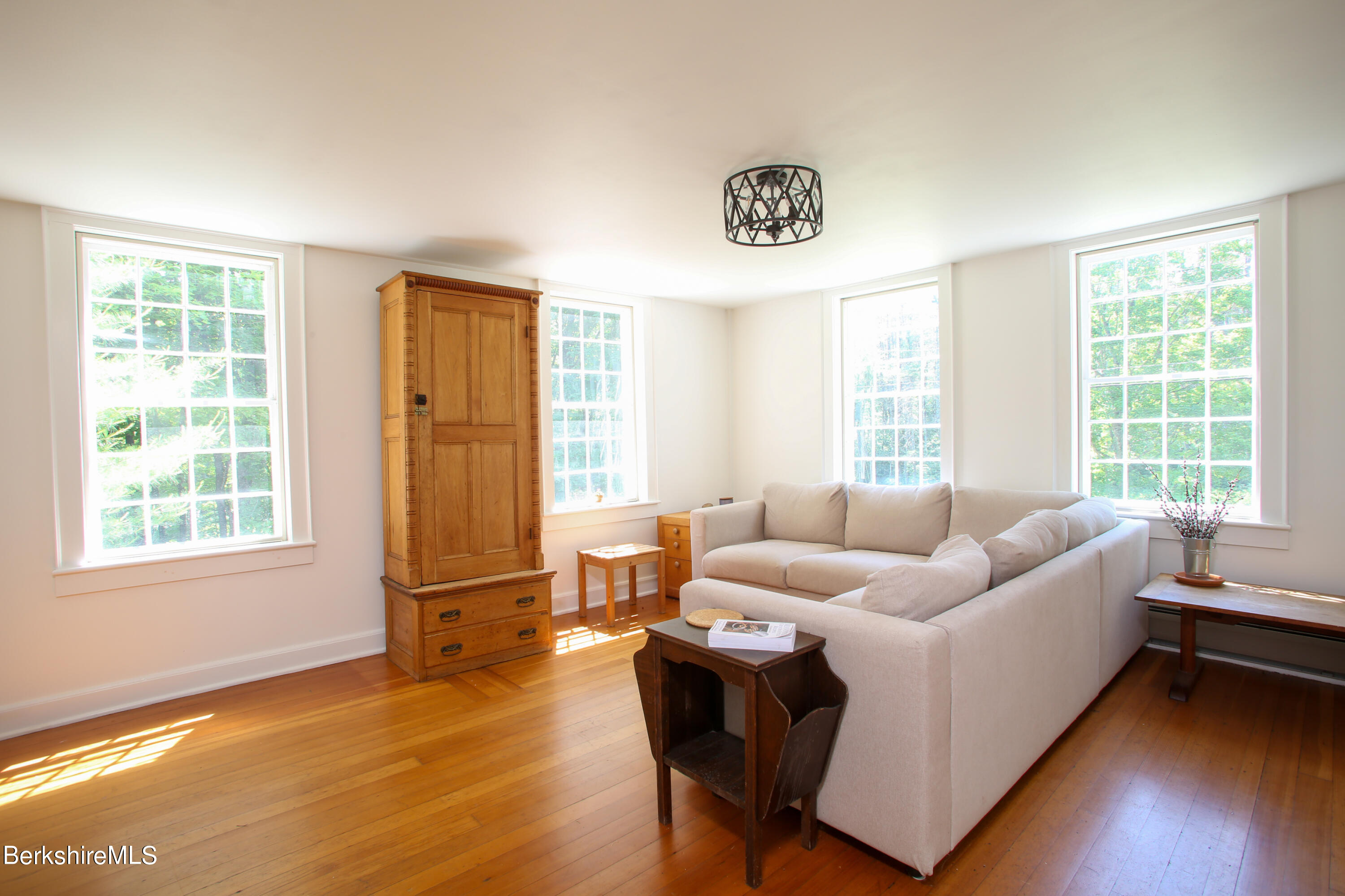 228 Zoar Road Rowe, MA 01367 - Photo 13 of 50 a living room with furniture and a window