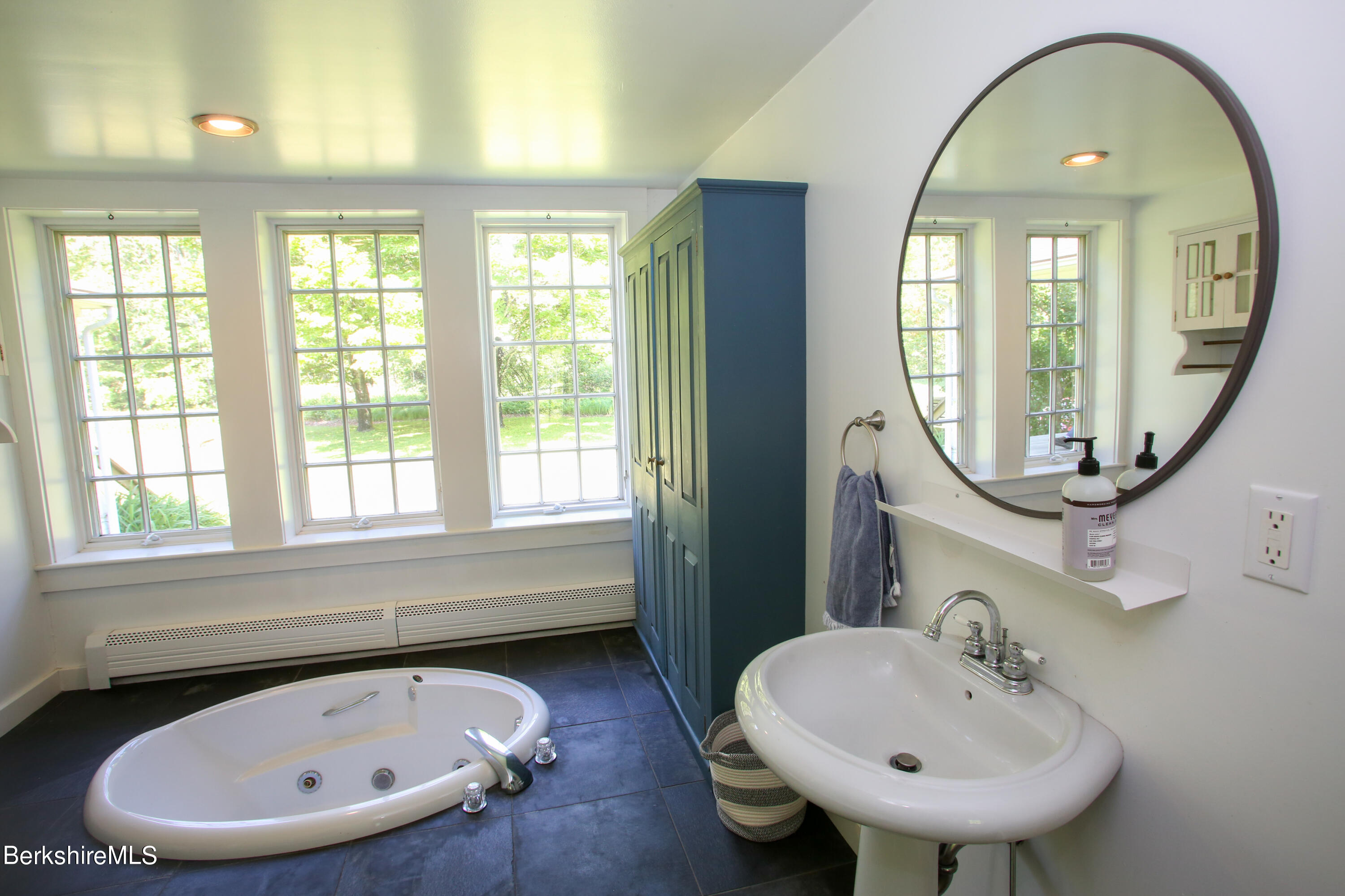 228 Zoar Road Rowe, MA 01367 - Photo 18 of 50 a bathroom with a sink and a mirror