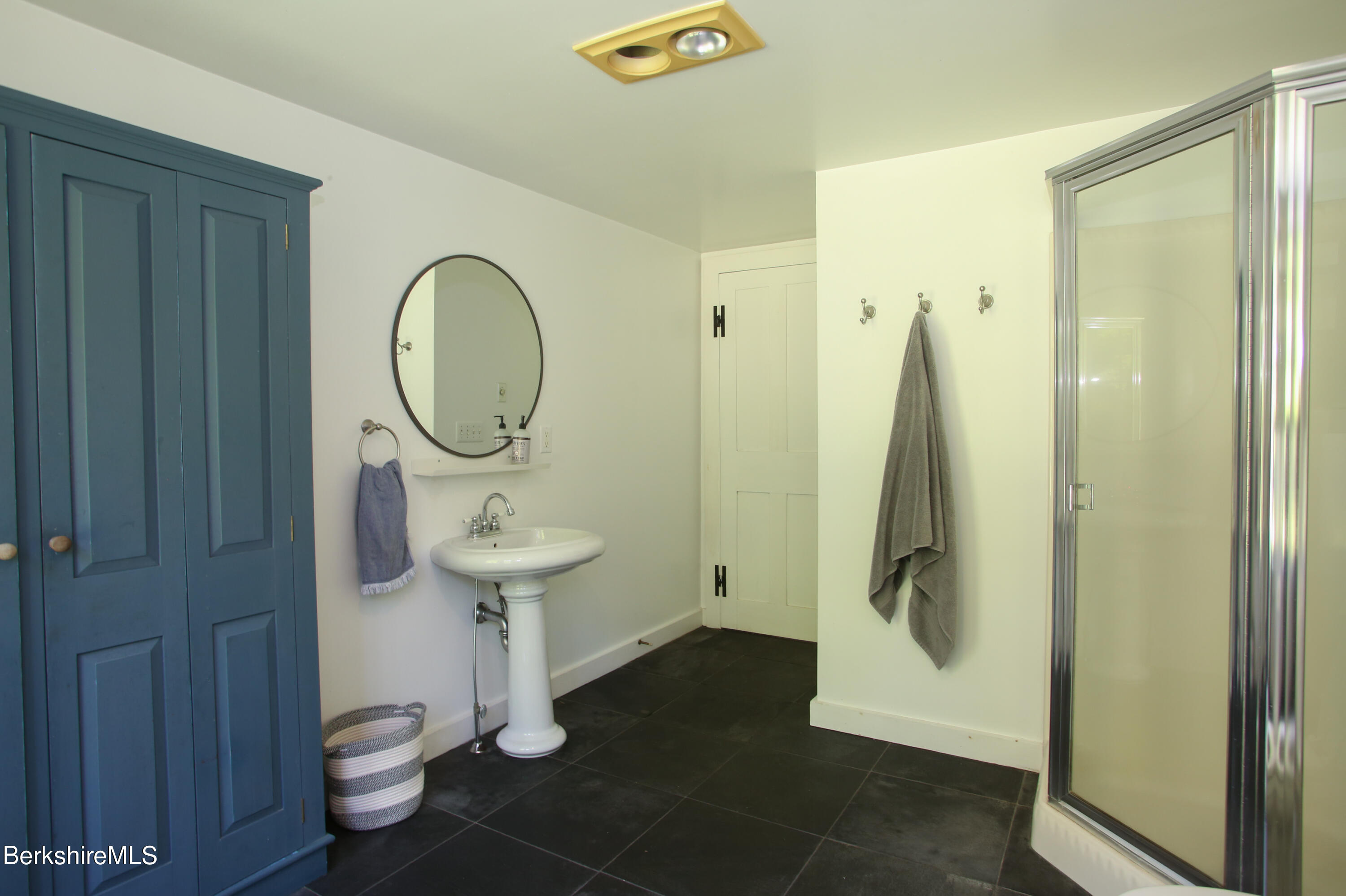 228 Zoar Road Rowe, MA 01367 - Photo 19 of 50 view of a bathroom with a toilet sink and a mirror