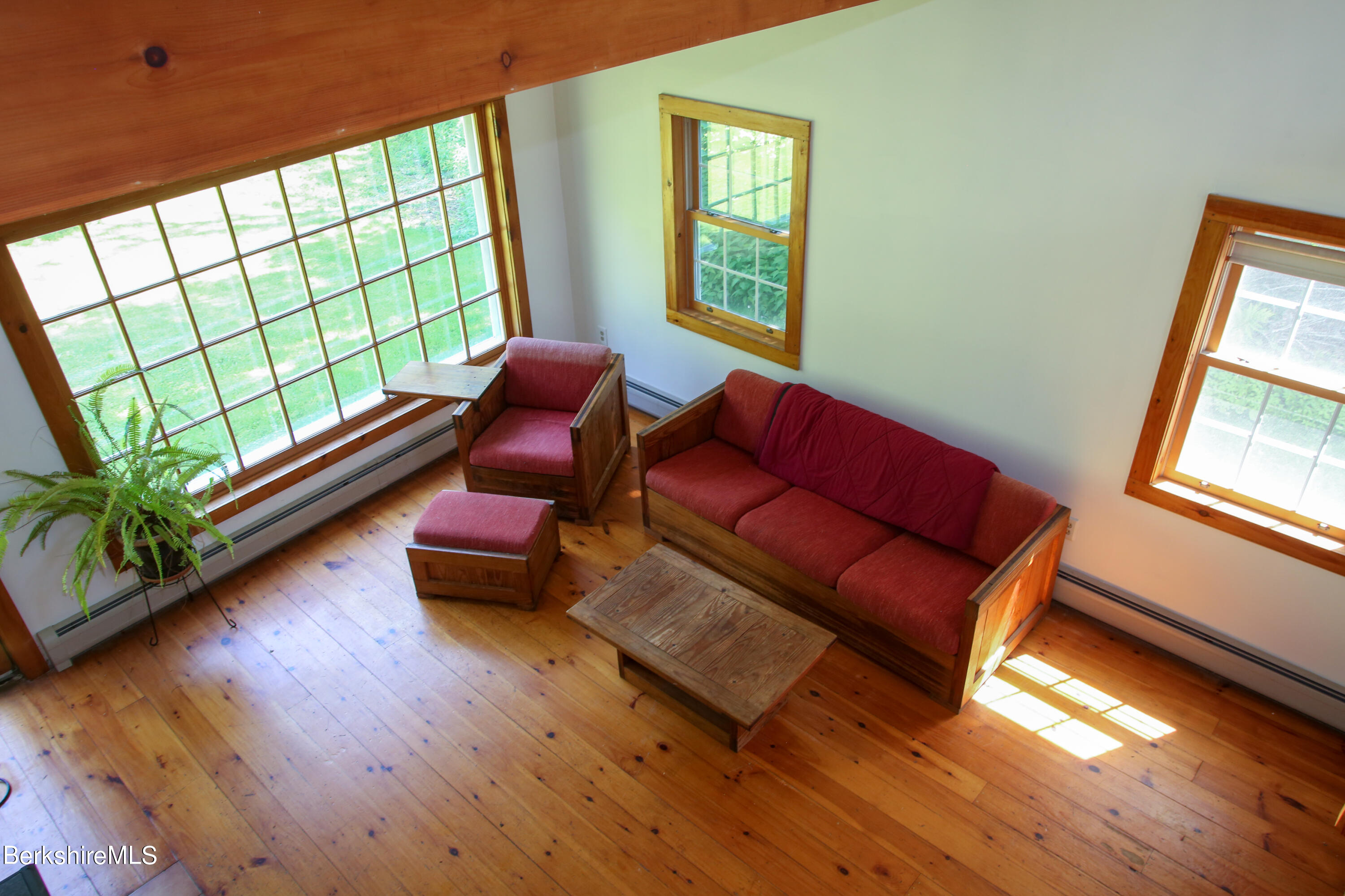 228 Zoar Road Rowe, MA 01367 - Photo 25 of 50 a living room with furniture and a window
