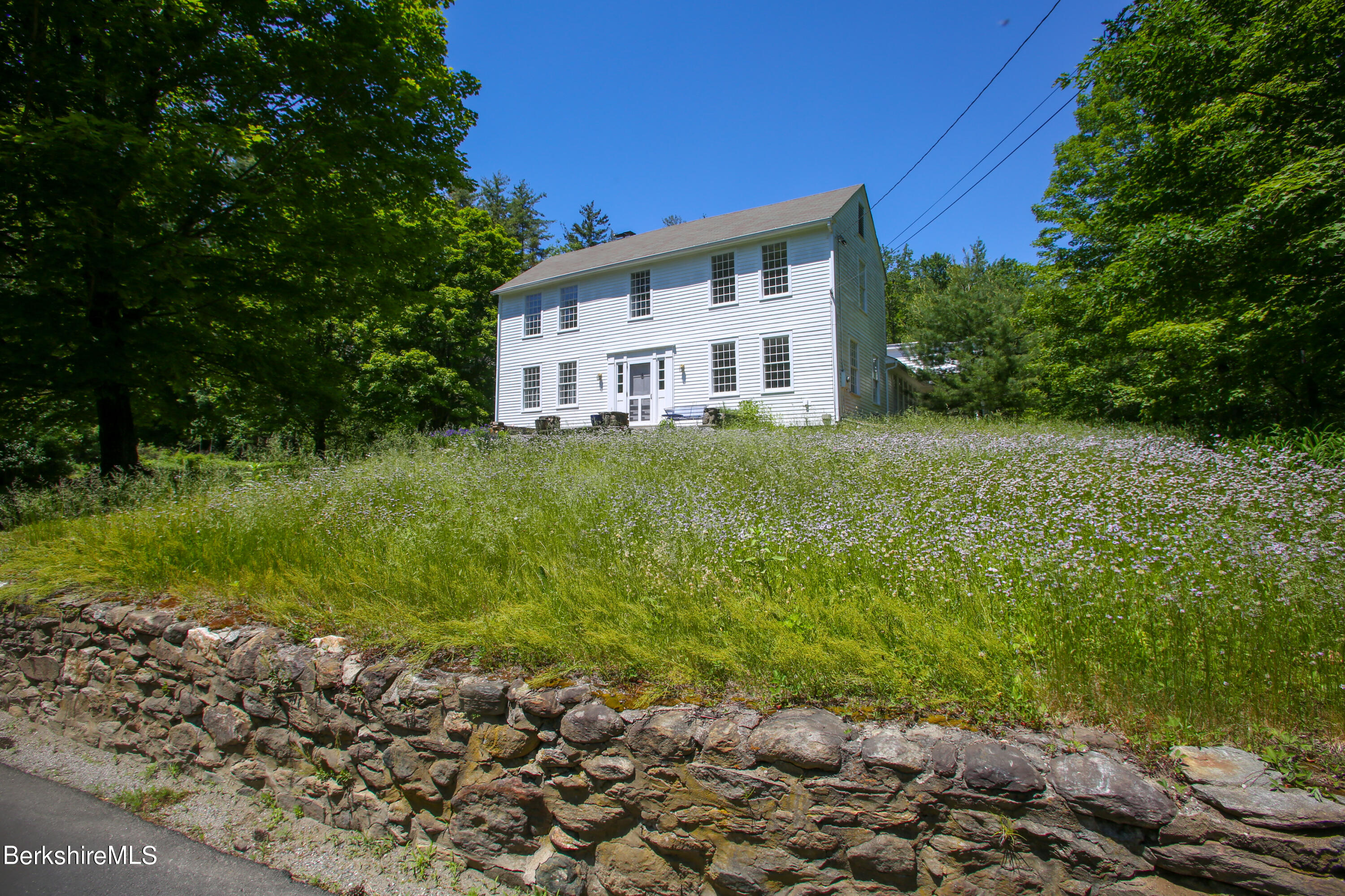 228 Zoar Road Rowe, MA 01367 - Photo 3 of 50 a view of a house with a yard