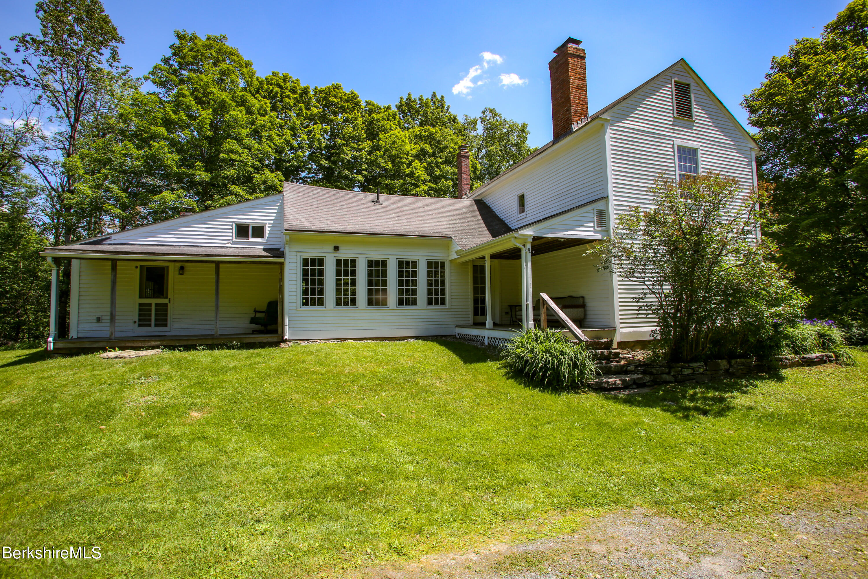 228 Zoar Road Rowe, MA 01367 - Photo 4 of 50 a view of a house with backyard and garden