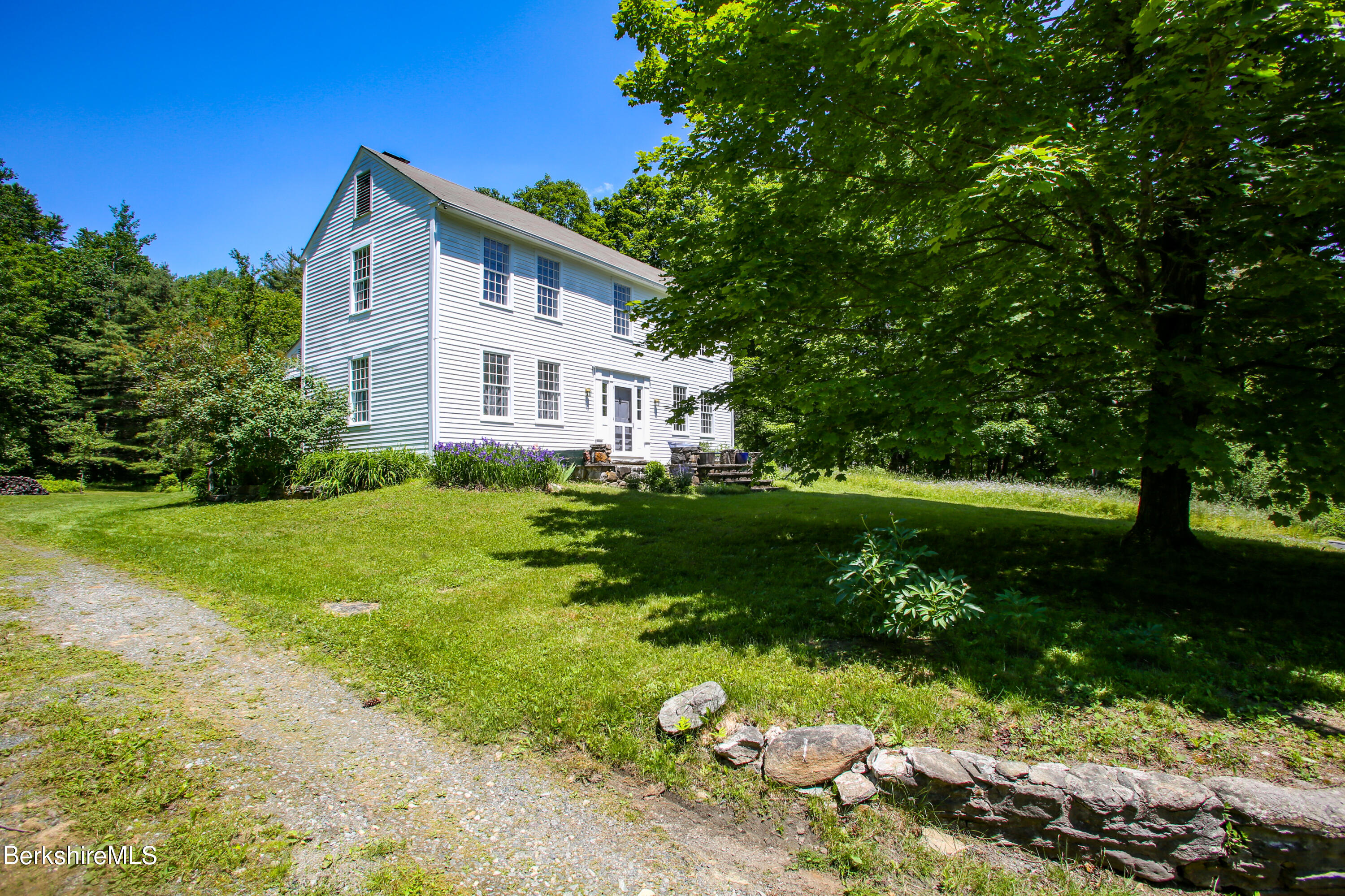 228 Zoar Road Rowe, MA 01367 - Photo 42 of 50 a view of a house with a yard