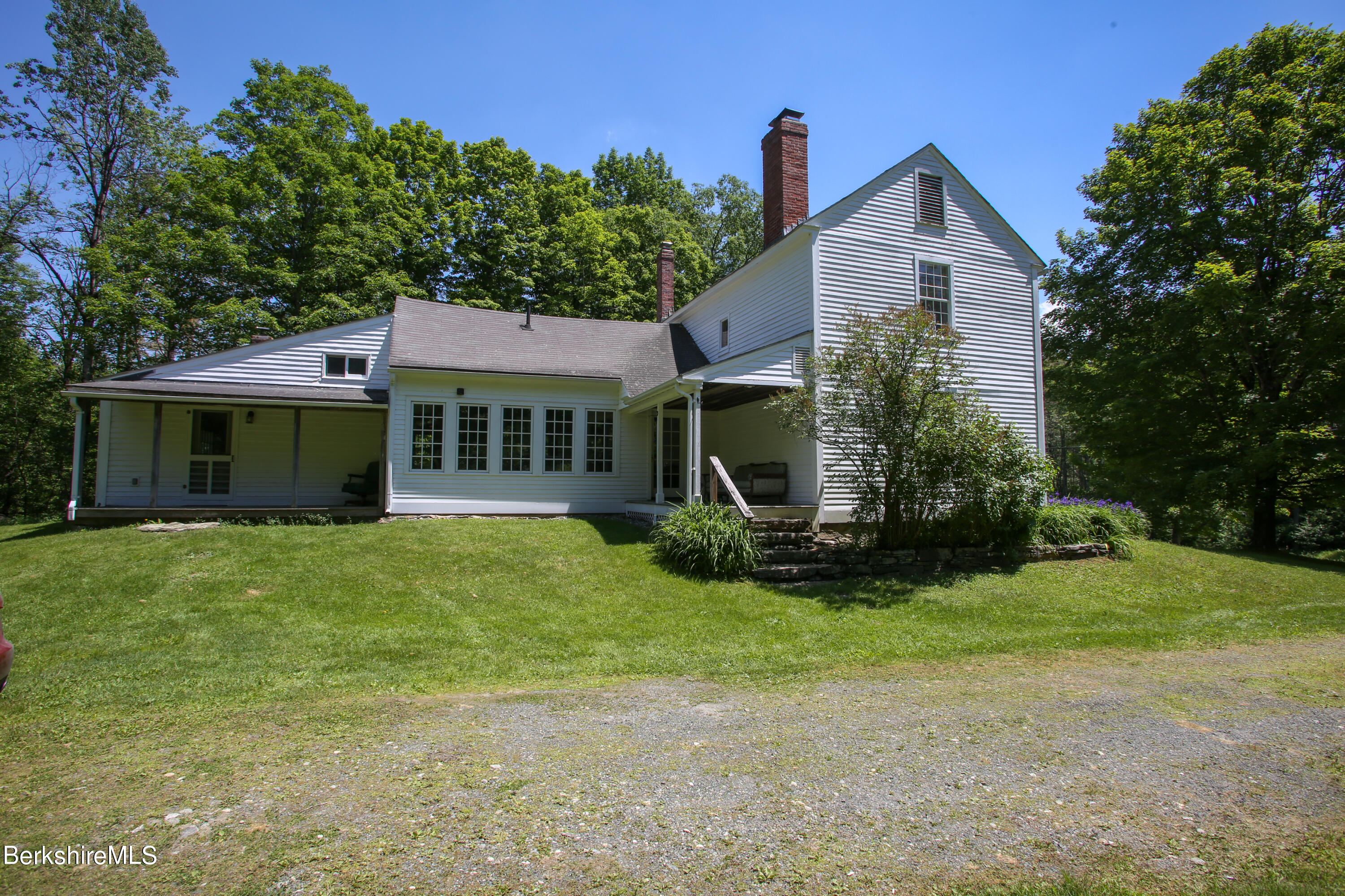 228 Zoar Road Rowe, MA 01367 - Photo 43 of 50 a view of a house with a yard