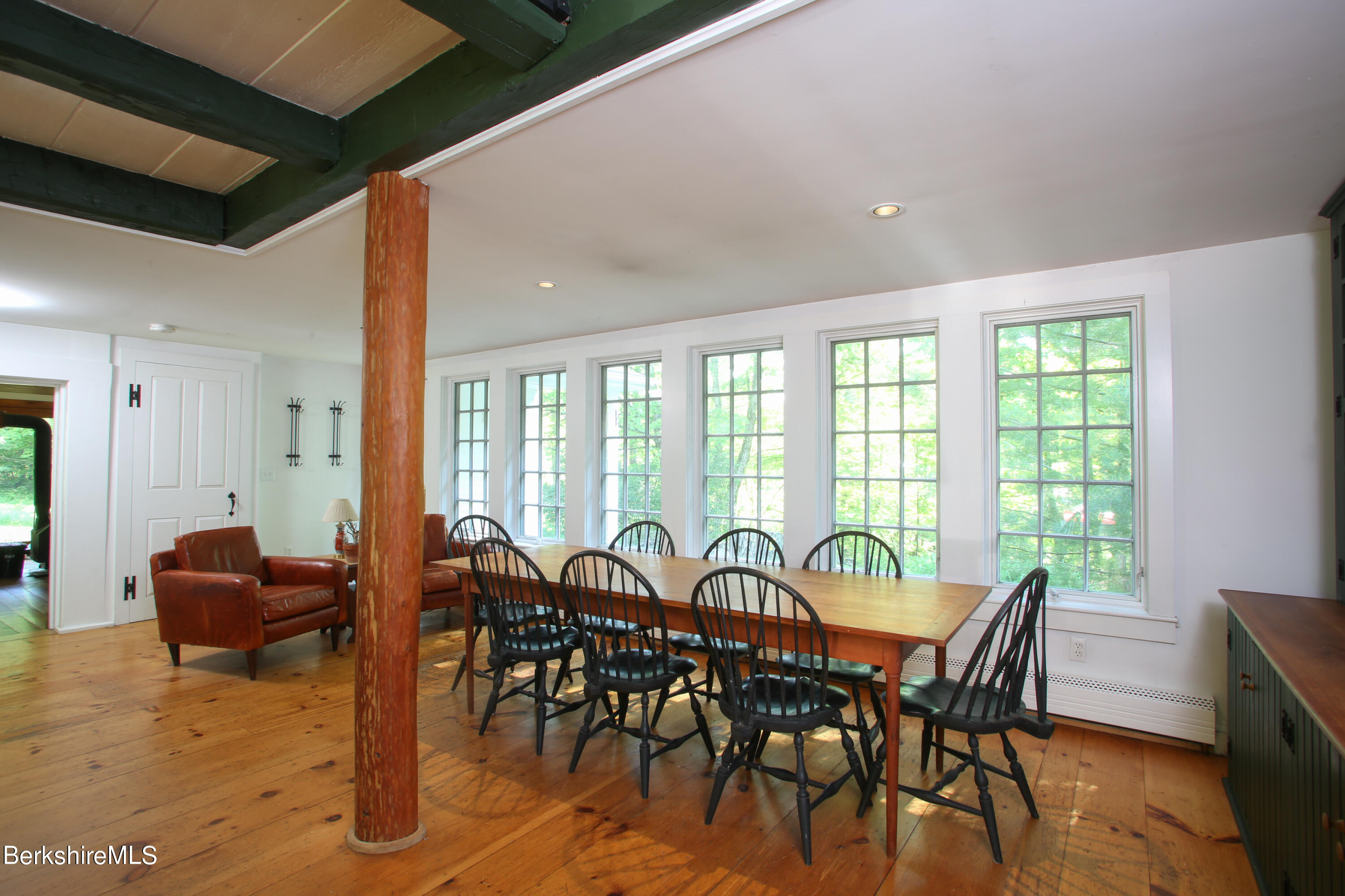 228 Zoar Road Rowe, MA 01367 - Photo 10 of 50 a view of a dining room with furniture window and outside view