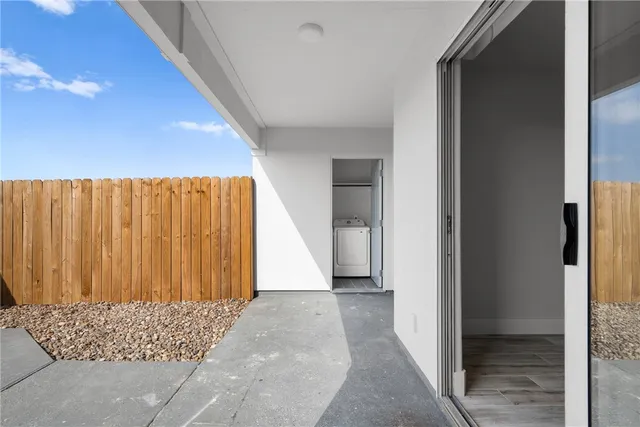 a view of entryway with wooden floor