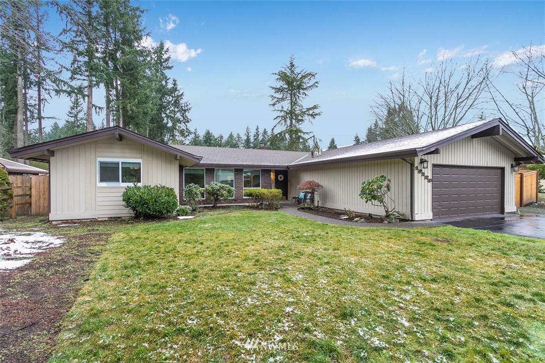 16120 Southeast 145th Place Renton, WA 98059 - Photo 1 of 22 a view of a house with a yard