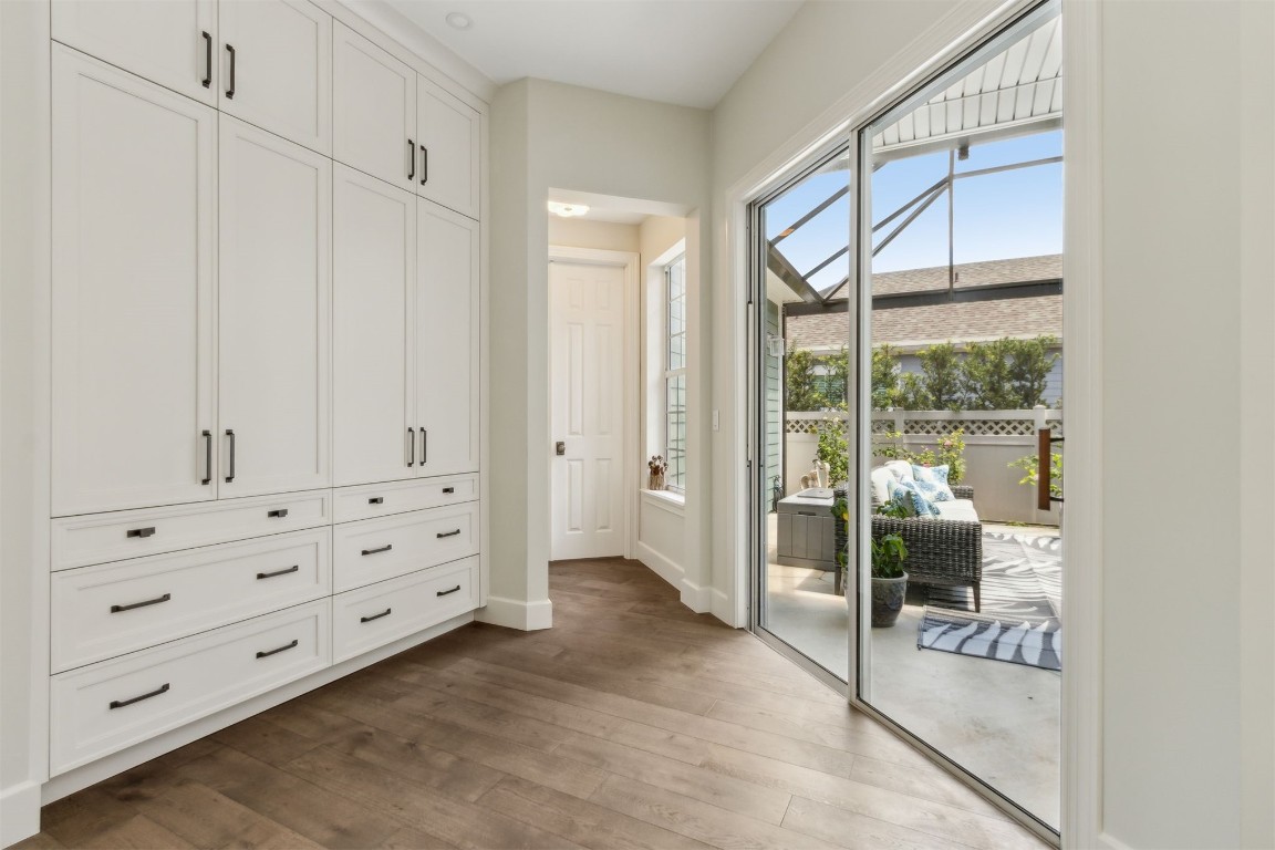 1775 Neighbor Street Fernandina Beach, FL 32034 - Photo 21 of 91 More custom built-ins provide space for pantry items, placemats, seasonal dinnerware....you decide.