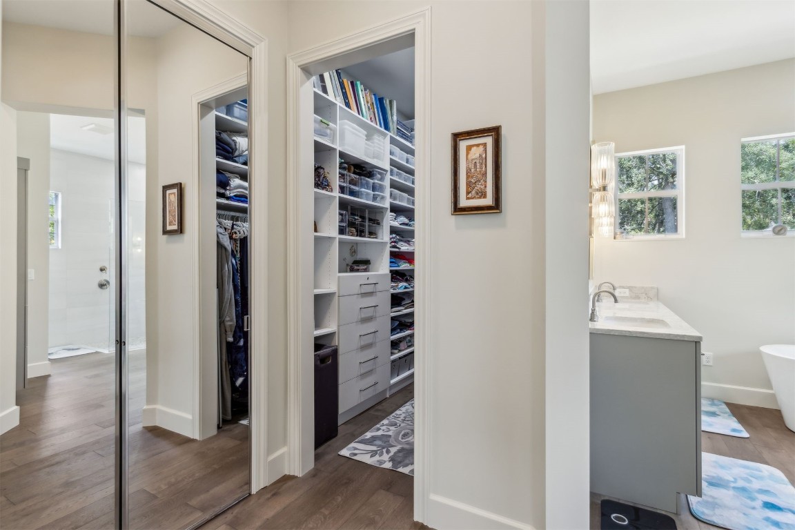 1775 Neighbor Street Fernandina Beach, FL 32034 - Photo 24 of 91 a view of walk in closet with window and wooden floor