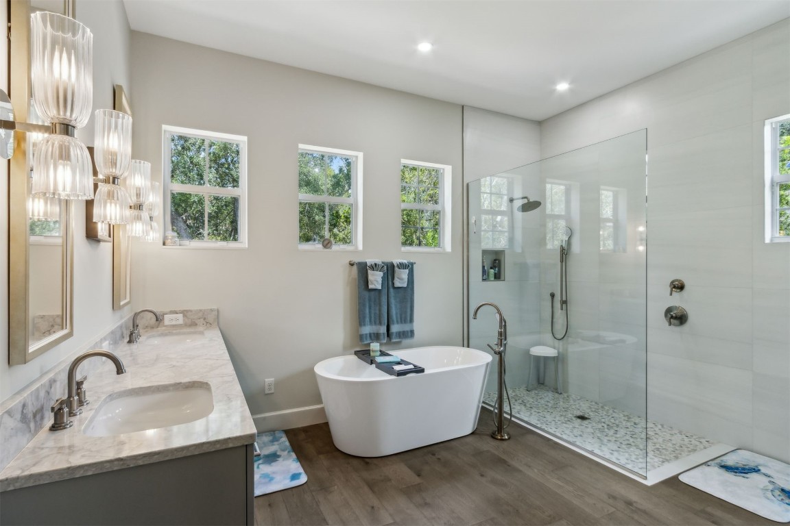1775 Neighbor Street Fernandina Beach, FL 32034 - Photo 25 of 91 a bathroom with a tub sink shower and mirror