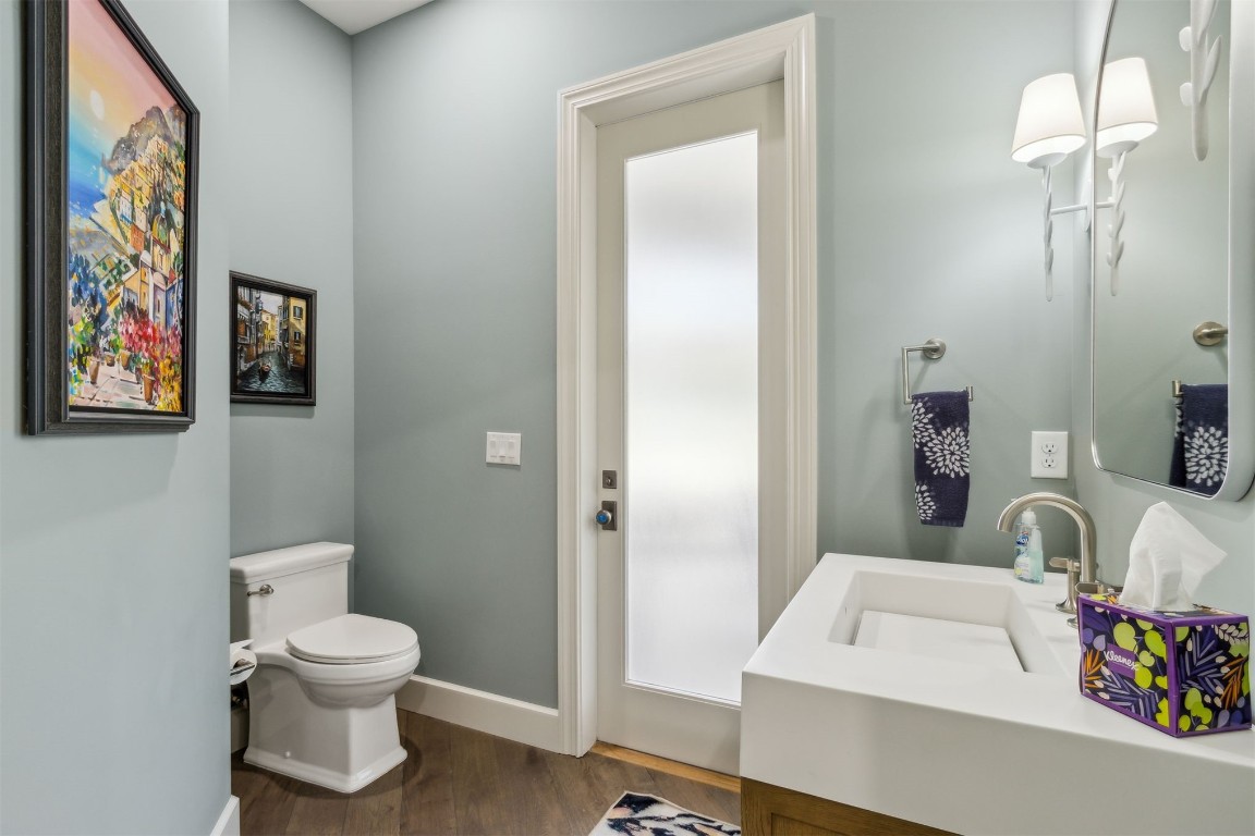 1775 Neighbor Street Fernandina Beach, FL 32034 - Photo 34 of 91 a bathroom with a sink toilet and a mirror