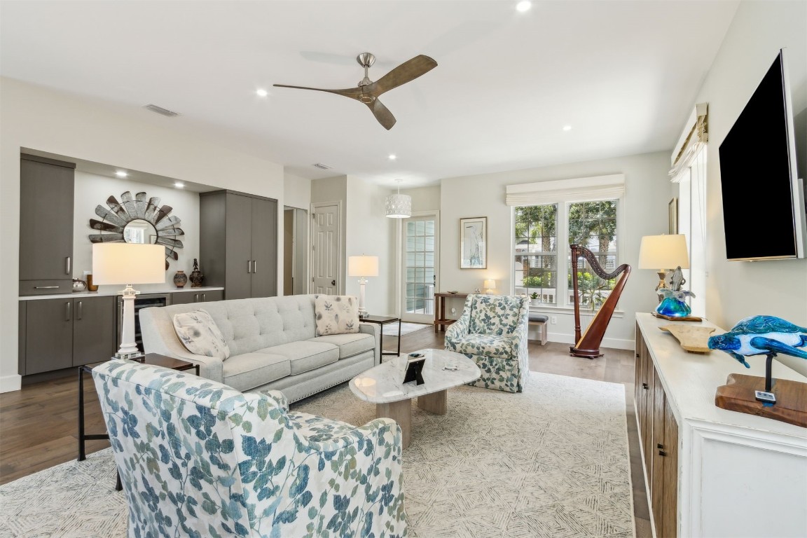 1775 Neighbor Street Fernandina Beach, FL 32034 - Photo 44 of 91 a living room with furniture and a flat screen tv