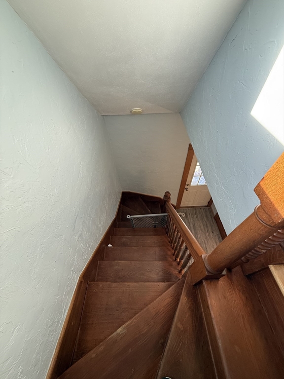 11 Forrest Street, Unit 2 Winthrop, MA 02152 - Photo 21 of 28 a view of stairs and an entryway
