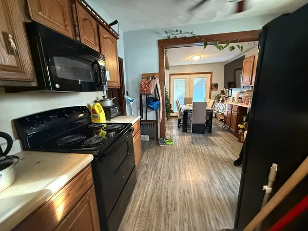 a kitchen with a stove and a microwave