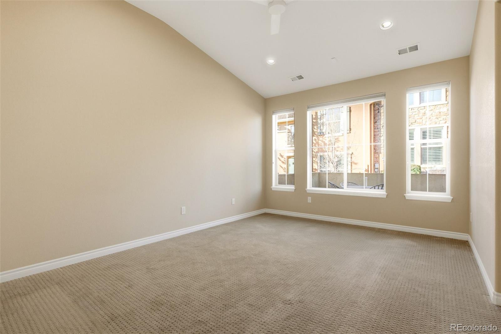 9470 Sori Lane Highlands Ranch, CO 80126 - Photo 13 of 32 an empty room with a window