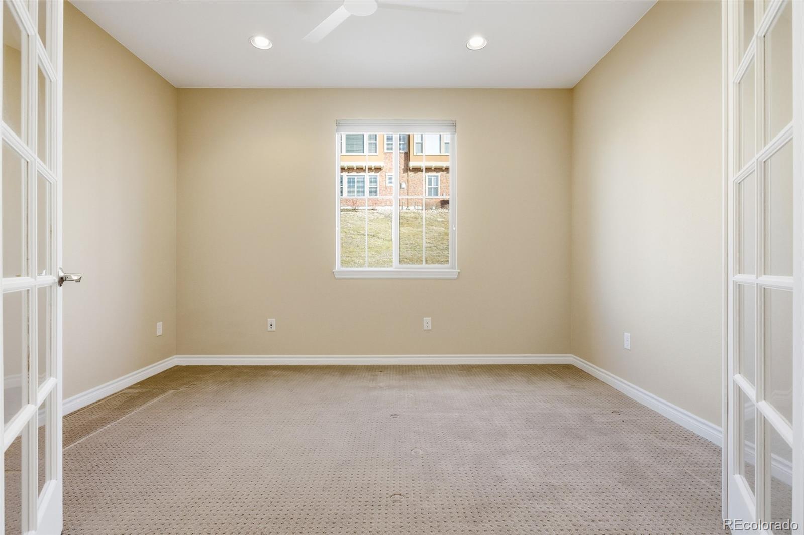 9470 Sori Lane Highlands Ranch, CO 80126 - Photo 19 of 32 an empty room with a window