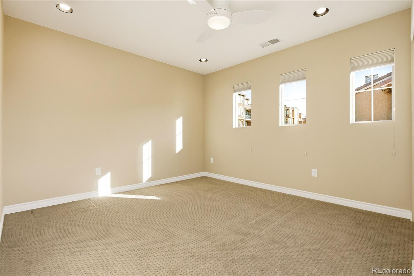 9470 Sori Lane Highlands Ranch, CO 80126 - Photo 26 of 32 a view of an empty room with a window