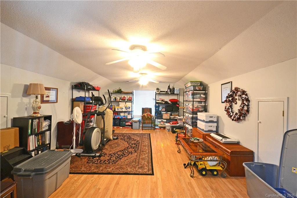 3070 Point Clear Drive Tega Cay, SC 29708 - Photo 18 of 22 a view of a room with gym equipment