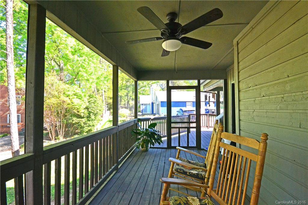 3070 Point Clear Drive Tega Cay, SC 29708 - Photo 20 of 22 a view of a porch with wooden floor