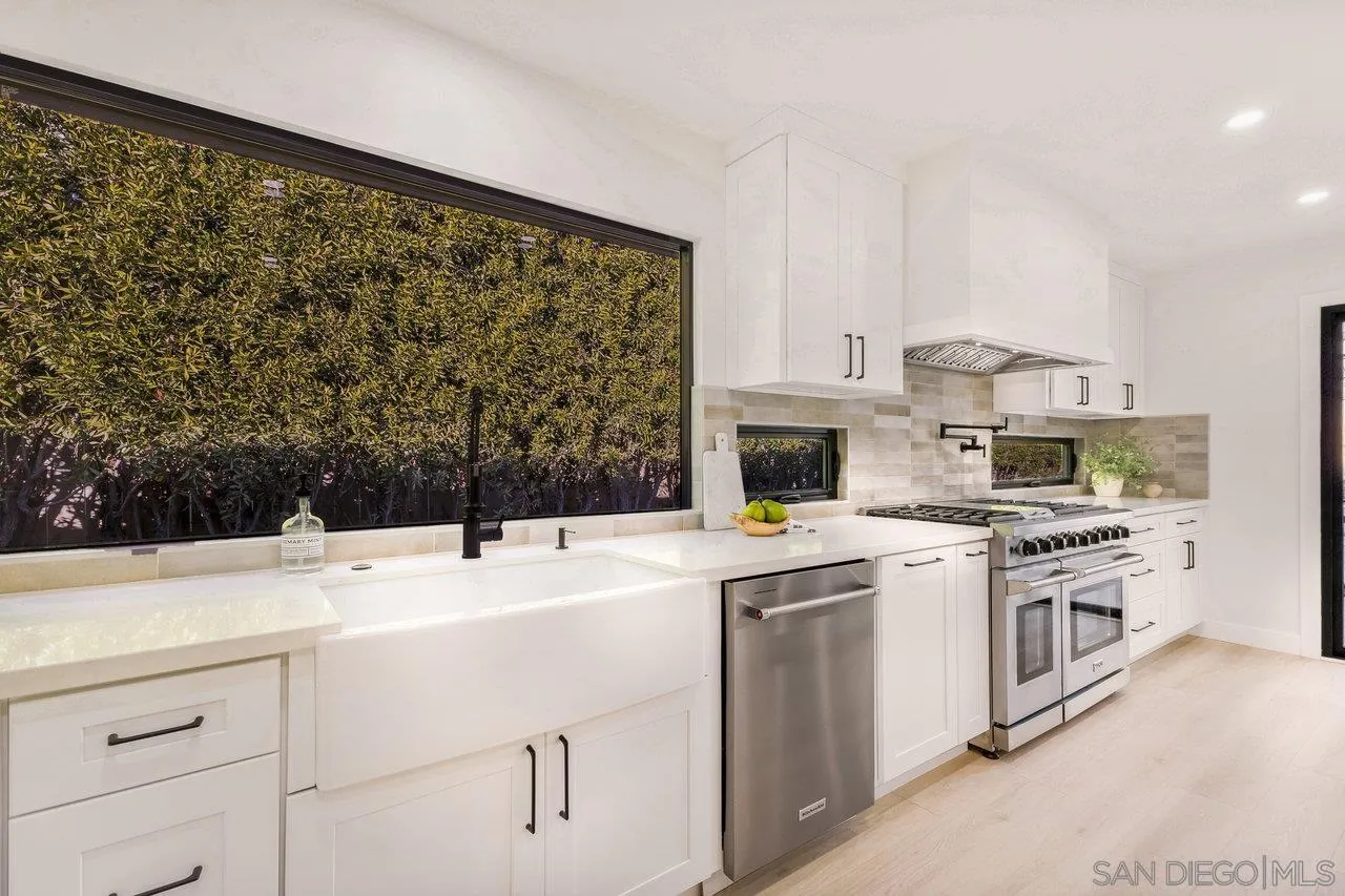 13783 Recuerdo Drive Del Mar, CA 92014 - Photo 14 of 56 a kitchen with a stove sink and cabinets