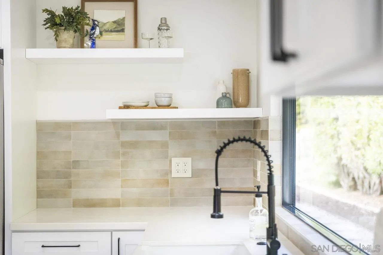 13783 Recuerdo Drive Del Mar, CA 92014 - Photo 18 of 56 a bathroom with a sink and a mirror