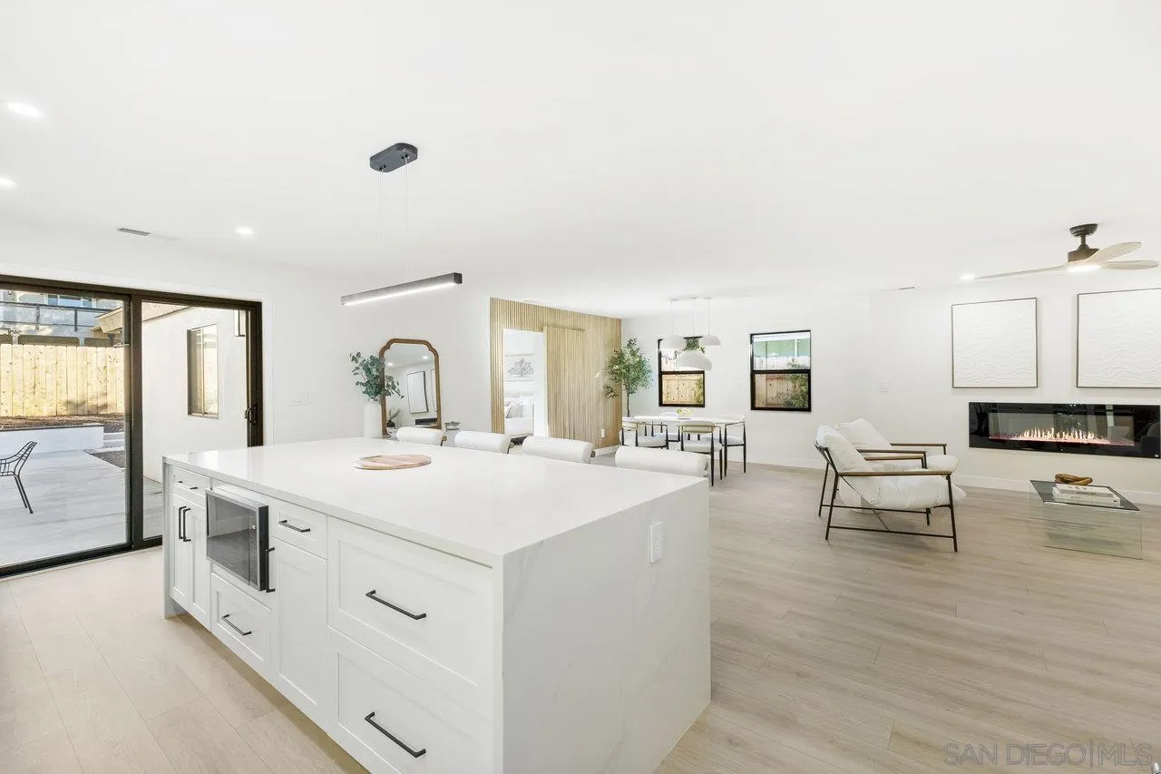 13783 Recuerdo Drive Del Mar, CA 92014 - Photo 19 of 56 a view of living room with granite countertop furniture and fireplace