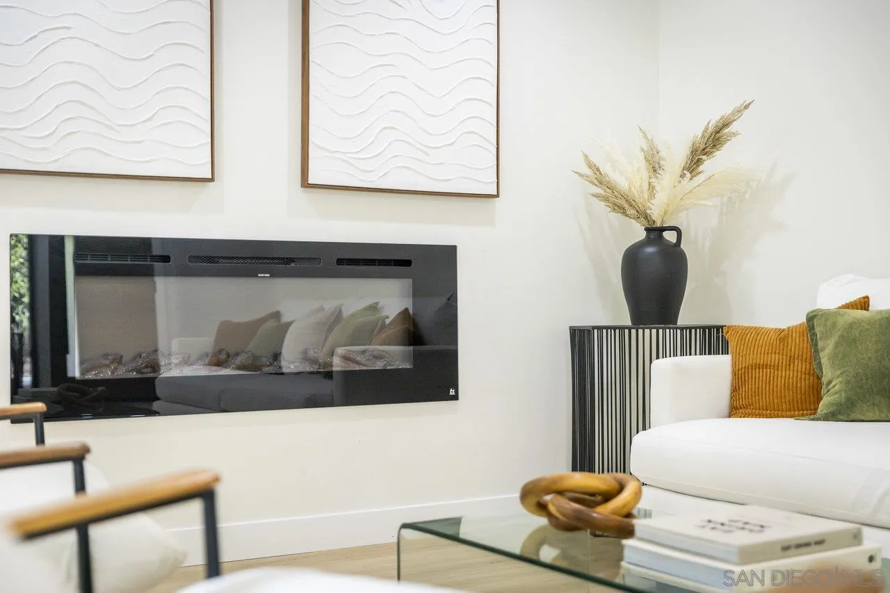 13783 Recuerdo Drive Del Mar, CA 92014 - Photo 21 of 56 a living room with furniture and a fireplace