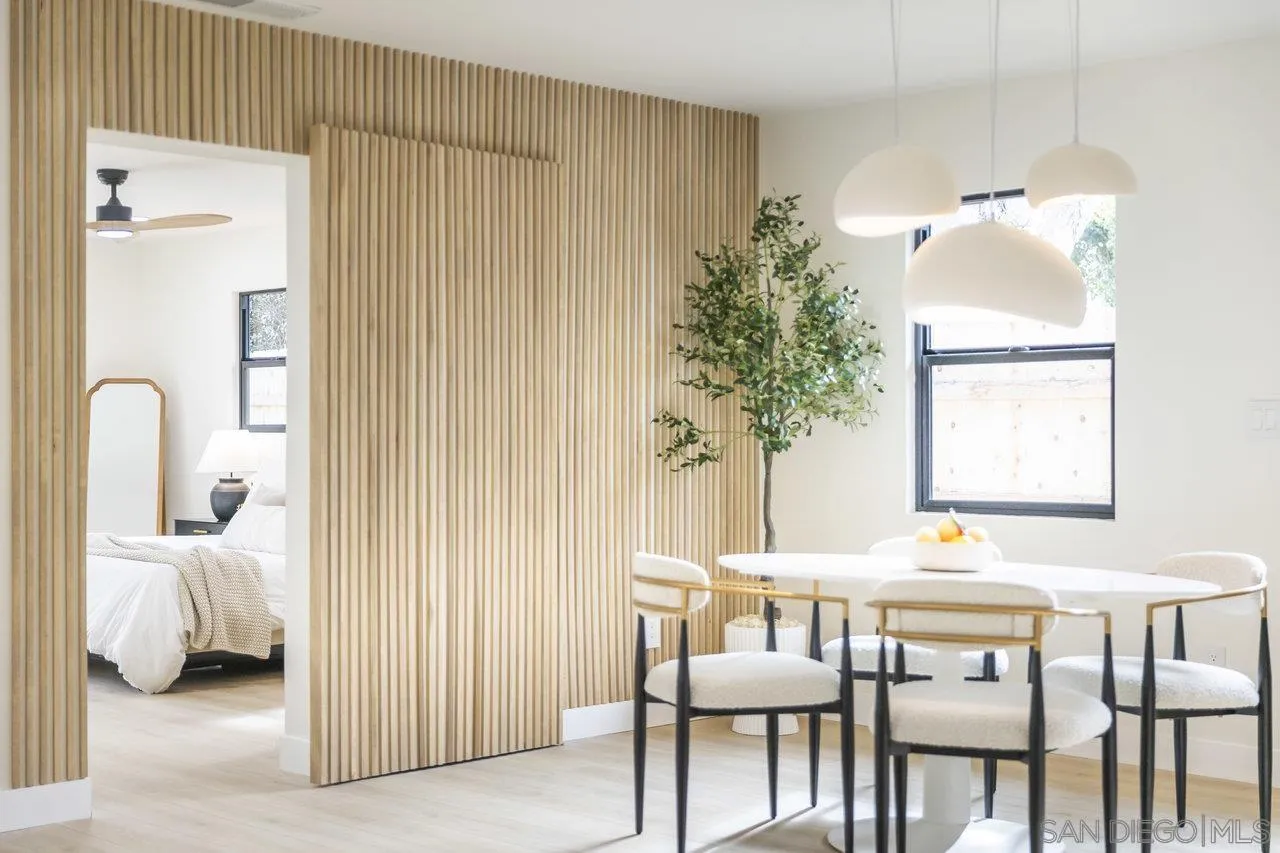 13783 Recuerdo Drive Del Mar, CA 92014 - Photo 23 of 56 a bedroom with a bed and a table chair