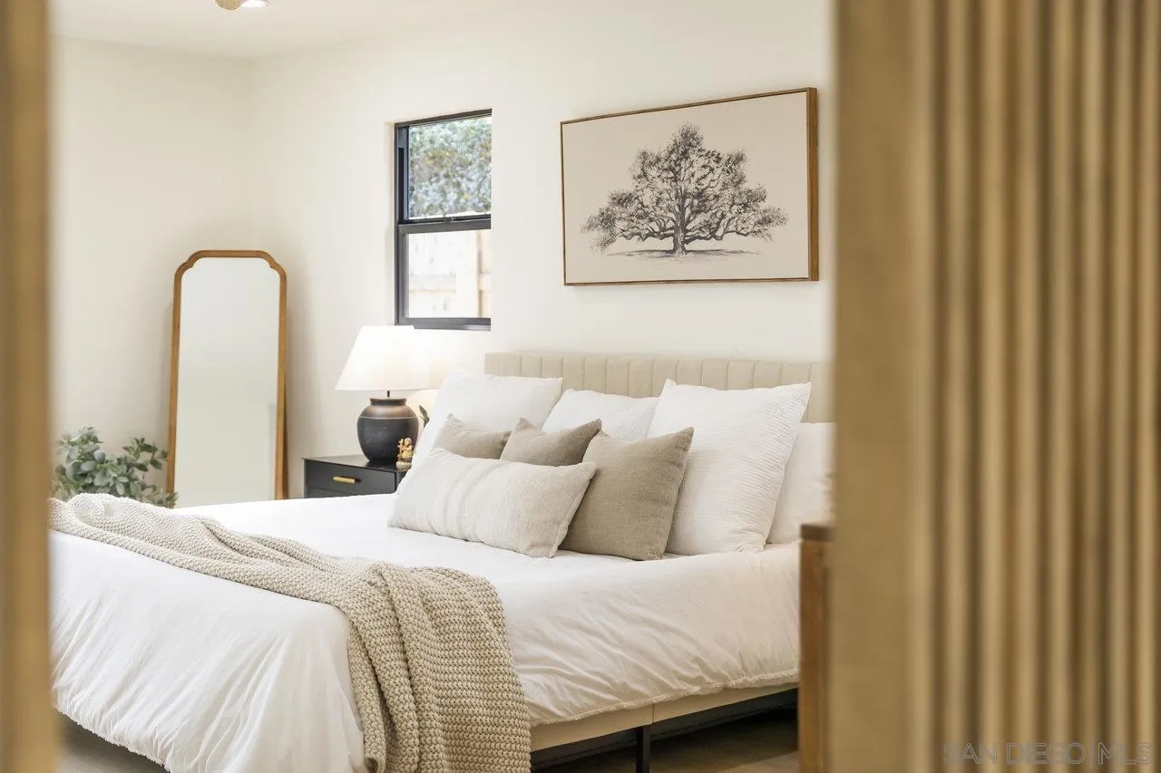 13783 Recuerdo Drive Del Mar, CA 92014 - Photo 25 of 56 a bedroom with bed and cupboard