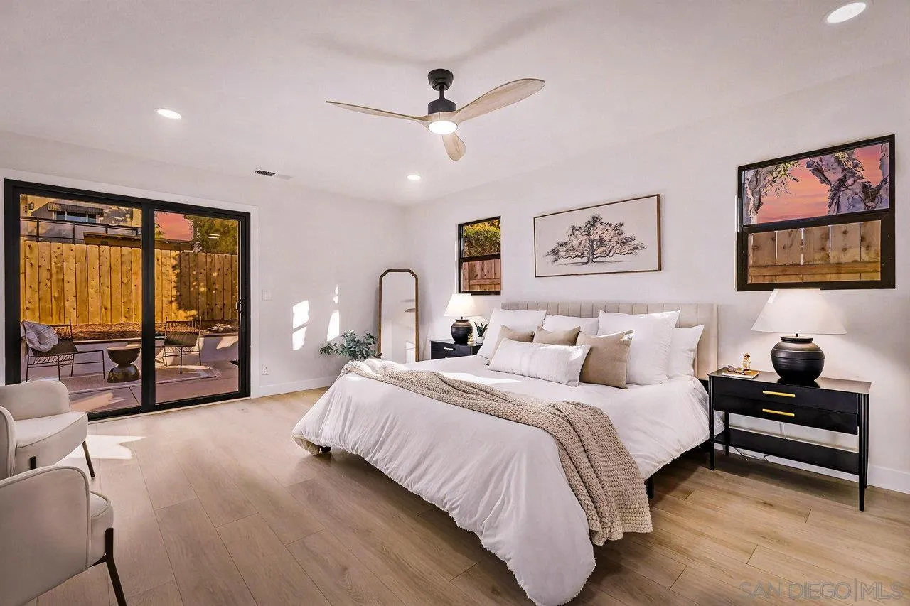 13783 Recuerdo Drive Del Mar, CA 92014 - Photo 26 of 56 a bedroom with a large bed and a large window