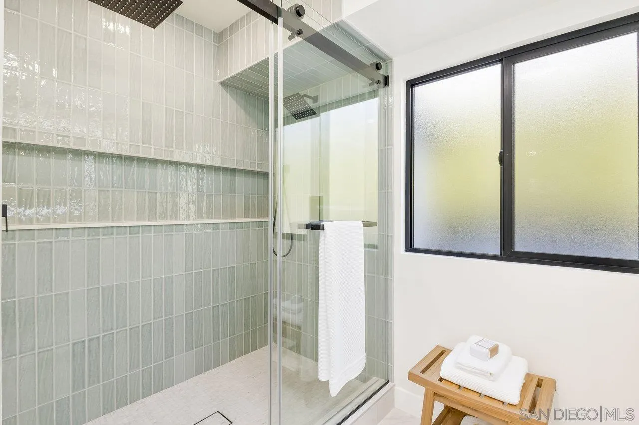 13783 Recuerdo Drive Del Mar, CA 92014 - Photo 32 of 56 a bathroom with a window and a shower