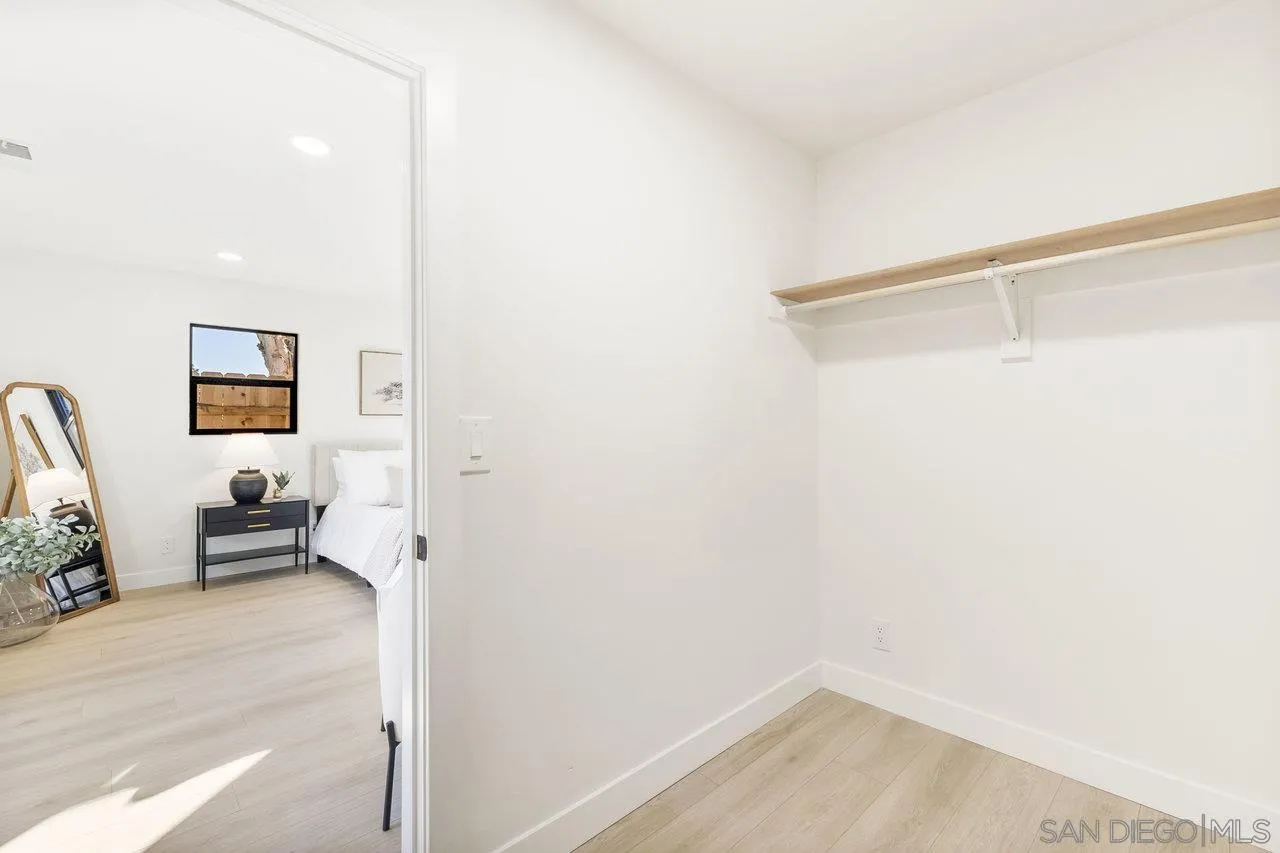 13783 Recuerdo Drive Del Mar, CA 92014 - Photo 34 of 56 a view of a room with wooden floor and furniture