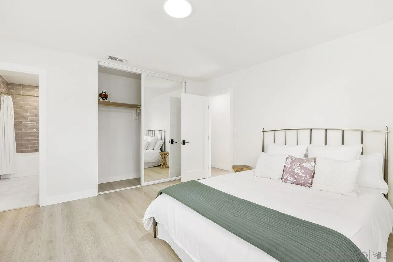 13783 Recuerdo Drive Del Mar, CA 92014 - Photo 40 of 56 a bedroom with a bed and closet