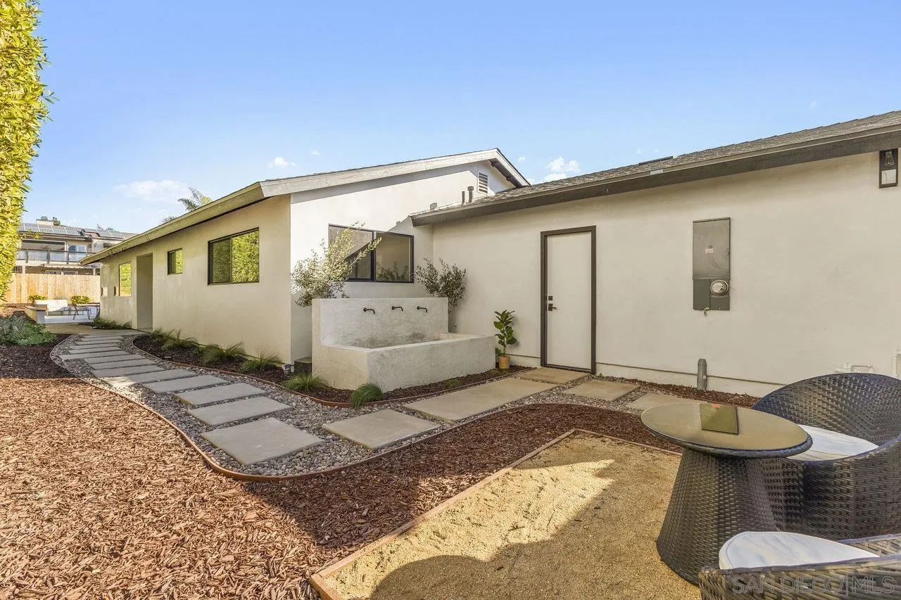 13783 Recuerdo Drive Del Mar, CA 92014 - Photo 44 of 56 a front view of a house with a yard